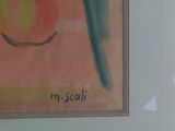 une photo d'un tableau sur le mur d'une salle de bain