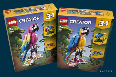 deux boîtes de jouets Lego Creator sur lesquelles est posé un perroquet