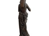 an image of a statue of a woman holding a flower