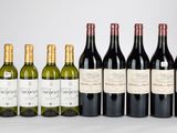 six bouteilles de vin sont alignées sur une table