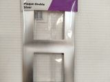 the packaging of a couple of plugs are on a white surface