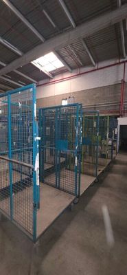 an image of a caged in area of a warehouse
