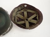 two helmets that are sitting next to each other on a table