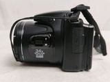 a close up of a digital camera on a table