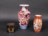 three vases sitting next to each other on a table