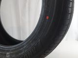 a close up of a tire on a white surface with a white background