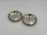 a pair of silver plated ashtrays