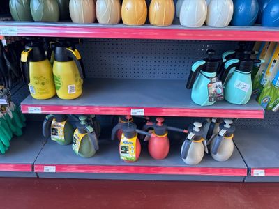 many different types of cleaning products on the shelves