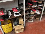 many pairs of shoes that are sitting on a shelf