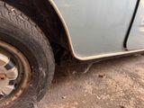 a close up of a flat tire on a car