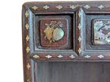 a small wooden cabinet with two drawers and a mirror