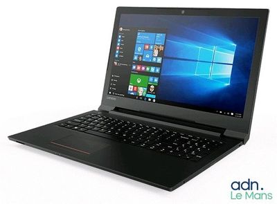 laptop with windows on the screen and keyboard on a white surface