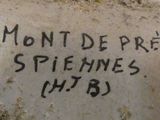 a sign on the wall that says mont de pre spieennes hh 35