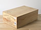 a wooden box that is sitting on a wooden table