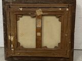 an old wooden picture frame with a picture of a window in the middle of it