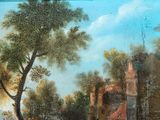 a painting on the wall of a building with a tree in the foreground