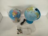 a blue globe with a map on it sitting on a table