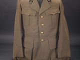an old military jacket with buttons on a mannequin mannequin