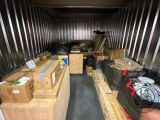 many boxes and boxes in the back of a moving truck