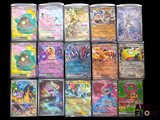 a lot of pokemon cards that are on the table