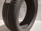 a close up of a tire on a white surface
