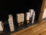 many different types of skin care products displayed on a shelf