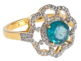 une image représentant une bague en or sertie d'une pierre bleue entourée de diamants