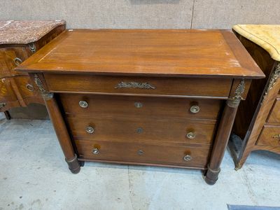 a wooden dresser with a marble top and two drawers