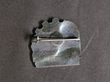 a piece of metal that has been placed on a table