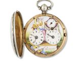 a pocket watch that has a picture of people on it