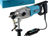 a close up of a drill with a box in the background