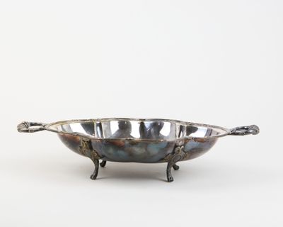an image of a metal bowl with handles on a white background