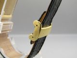 a close up of a watch on display on a table