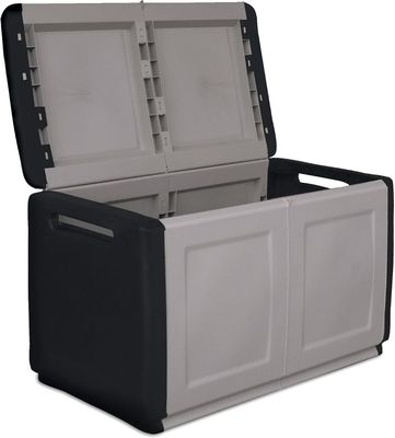 une boîte de rangement noire et blanche dont les deux portes sont ouvertes