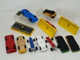 a lot of toy cars that are sitting on a table