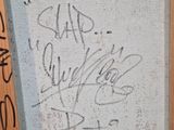 a picture of a baseball bat that has been written on the wall