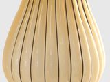 an image of a yellow vase with a black stripe on it