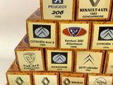 a stack of boxes that have different types of badges on them