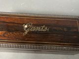 an old cigar case with the word giants on it