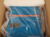 a cardboard box with a blue package inside of it