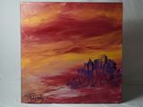 peinture représentant une ville au coucher du soleil sur fond blanc