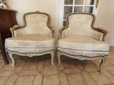 pair of antique french style chairs with upholstered arms