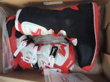 a box with a pair of shoes inside of it