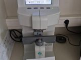 an image of a microscope with a monitor on top of it