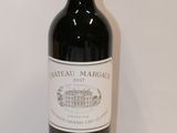 a bottle of wine that is sitting on a table