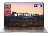 un ordinateur portable affichant Windows 11 à l'écran, avec une montagne en arrière-plan