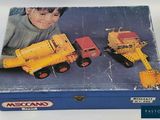 a box with a picture of a boy playing with construction vehicles