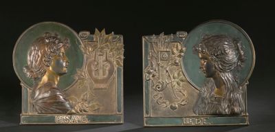 pair of art nouveau bronze bookends of a woman and a man