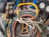 many hoses that are sitting in the back of a truck
