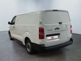 a picture of a white van parked in a room